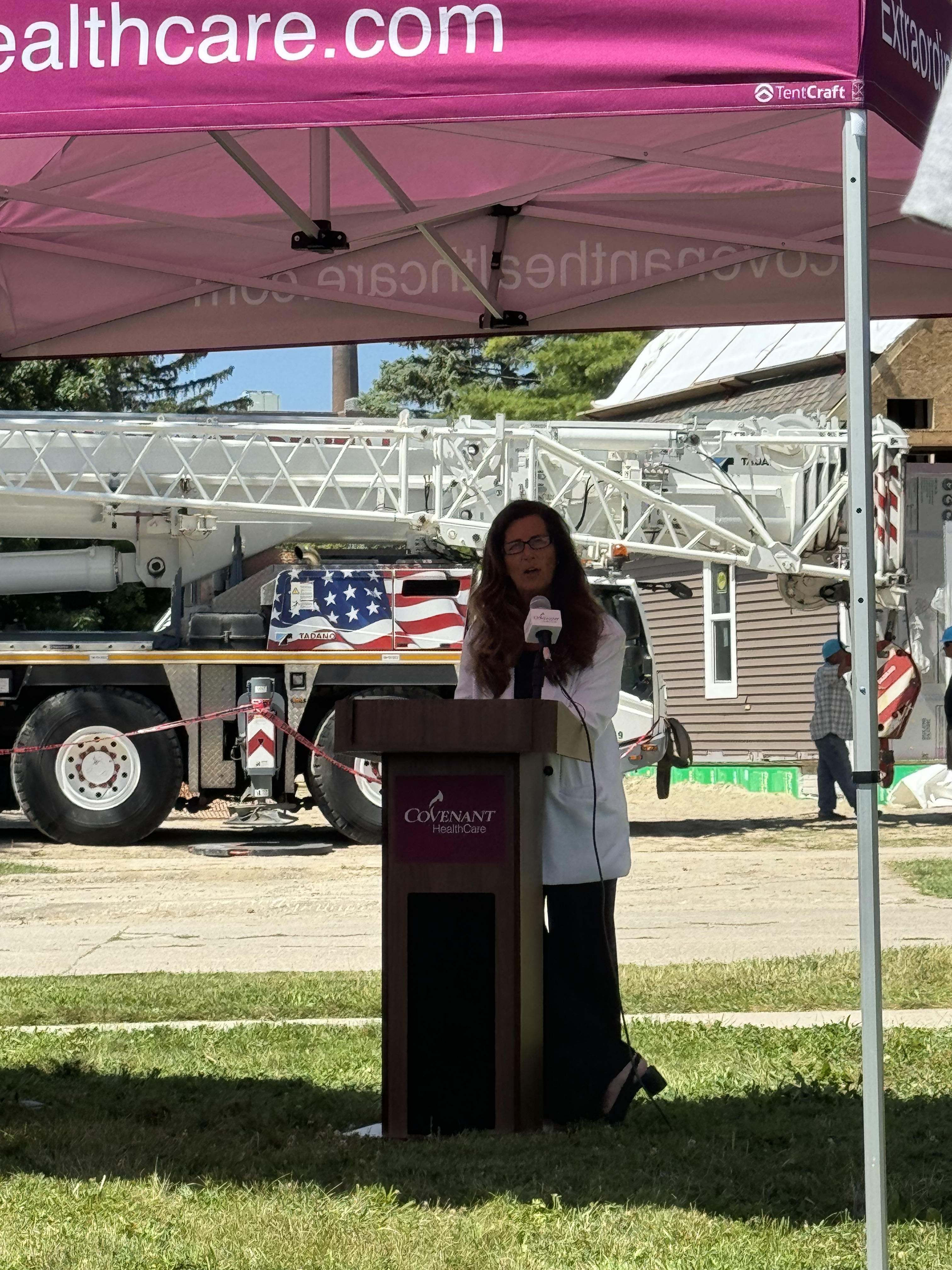 Beth Charlton speaking at Saginaw-Shiawassee Habitat event